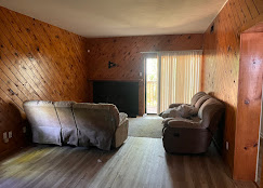 Living room with old furniture ready for junk removal