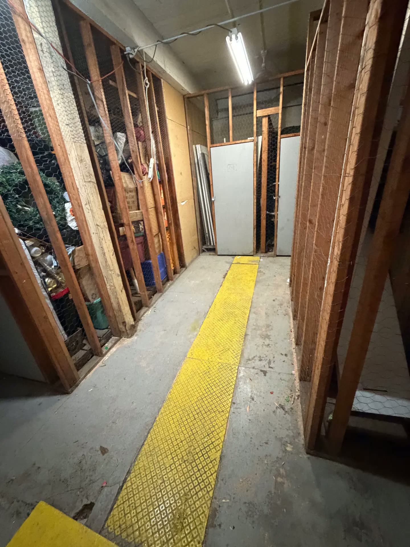 Swept basement walkway after flood cleanout