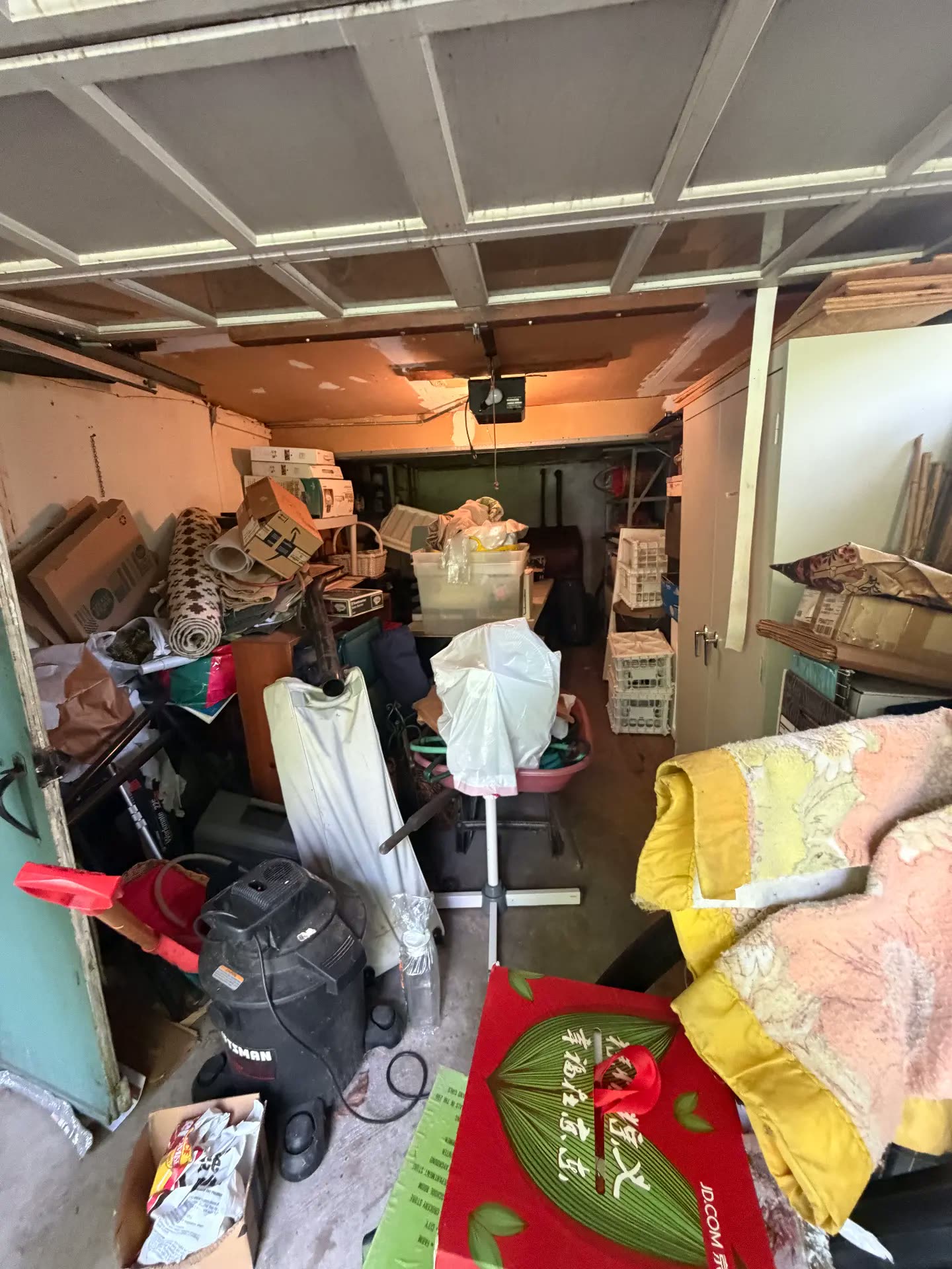 Garage packed with boxes before cleanout in CT