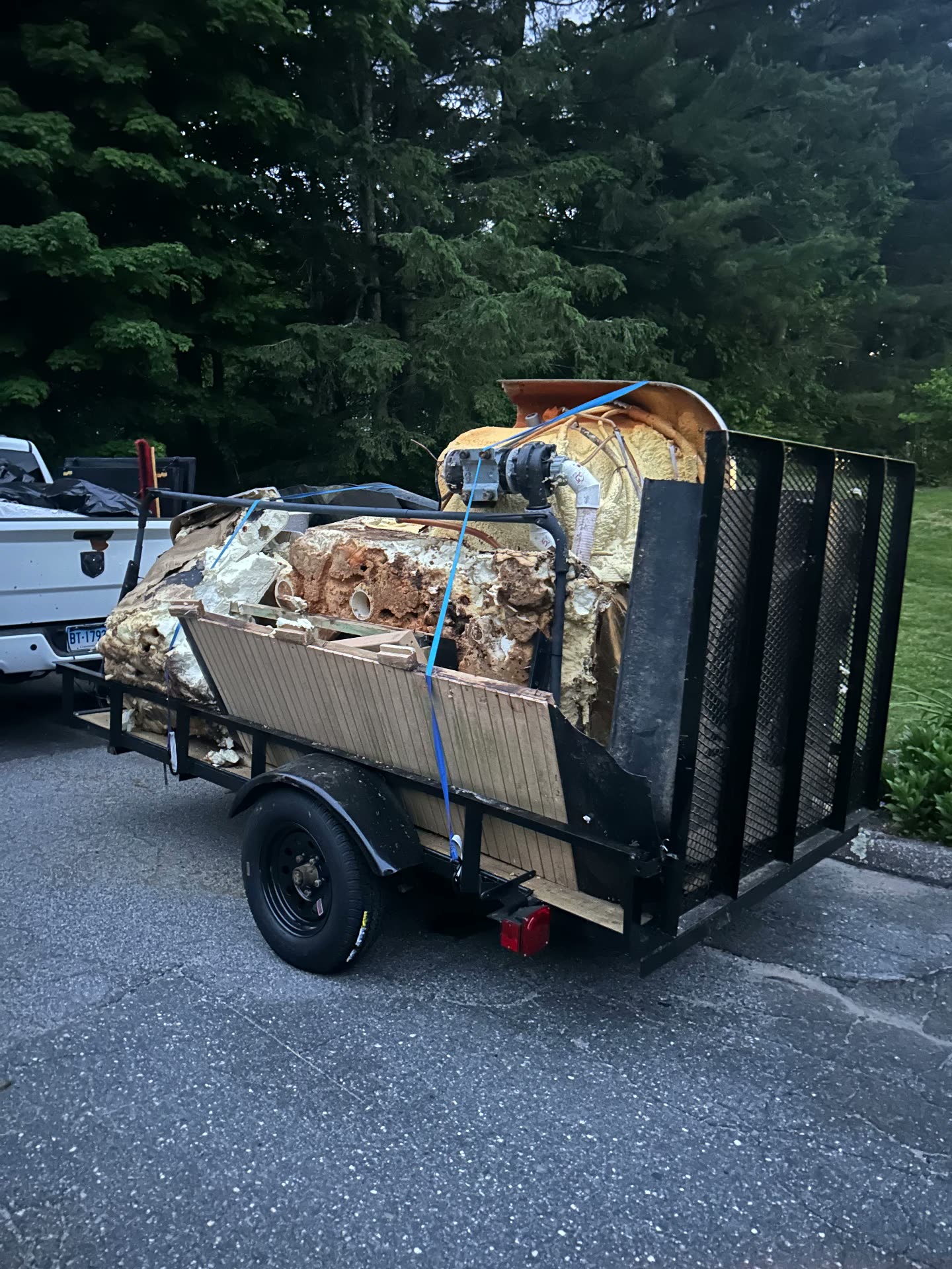 Trailer loaded with sawed up hot tub debris